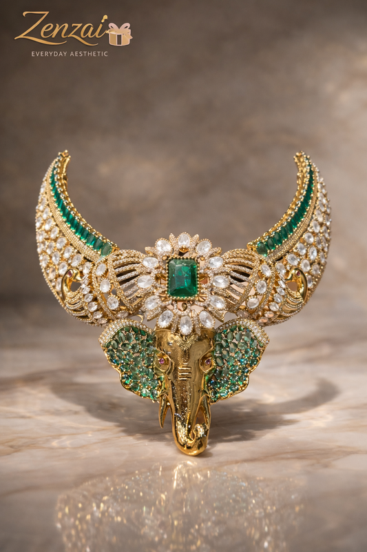 Zenzai elephant matha choker headpiece with emerald center stone, white crystal detailing and gold crescent design
