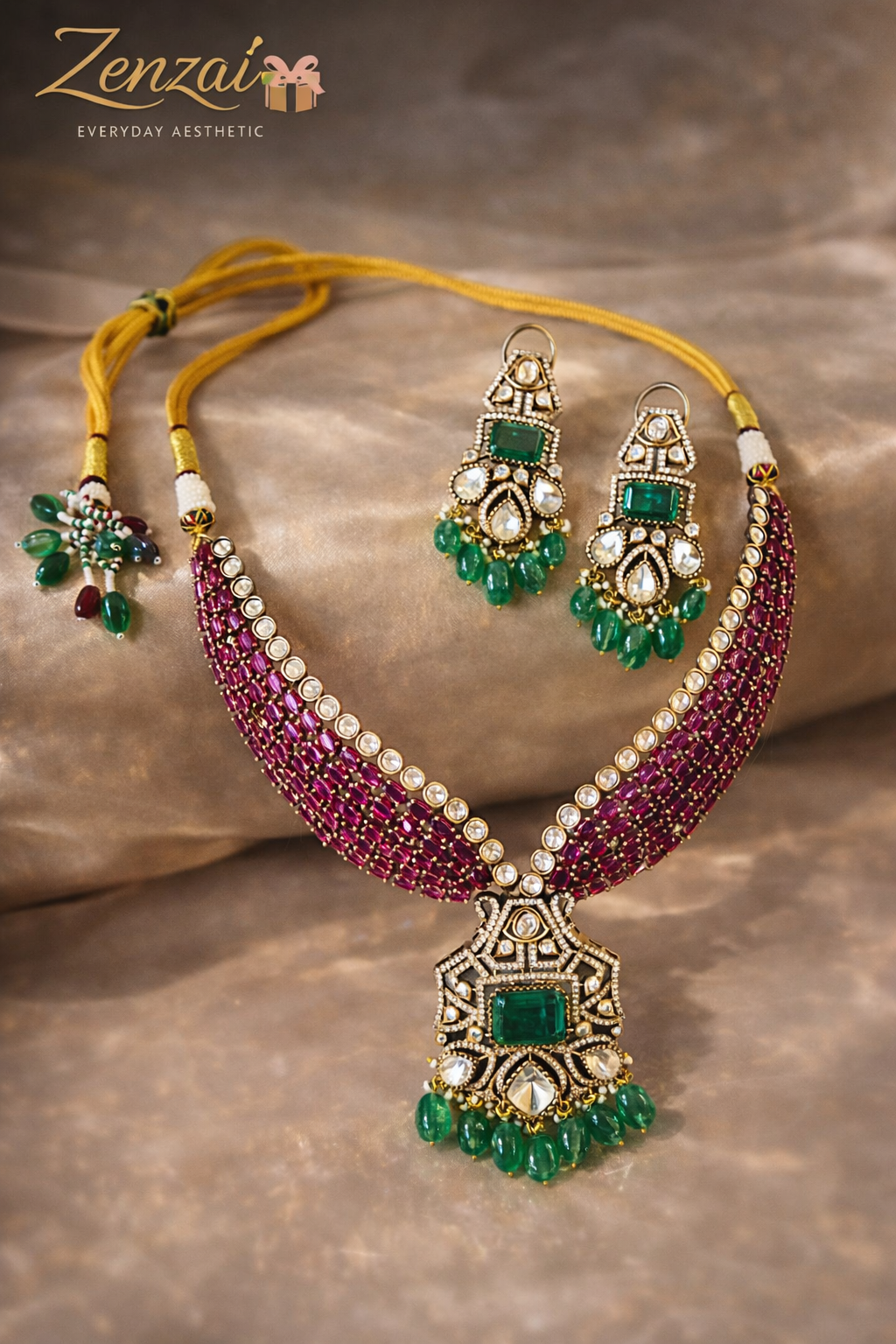 Zenzai ruby and emerald polki necklace set with V-shaped choker design, geometric pendant and matching green drop earrings
